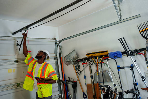 Professional Garage Door Panel Replacement technician working in Brookville, IN